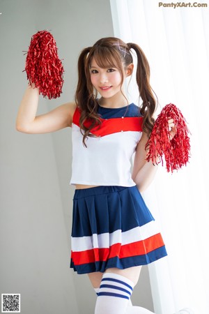 A naked asian woman in white tights and red pom poms.