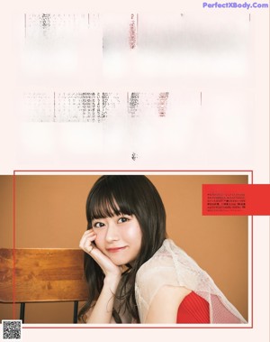 A magazine page with a picture of a woman in a paper airplane.